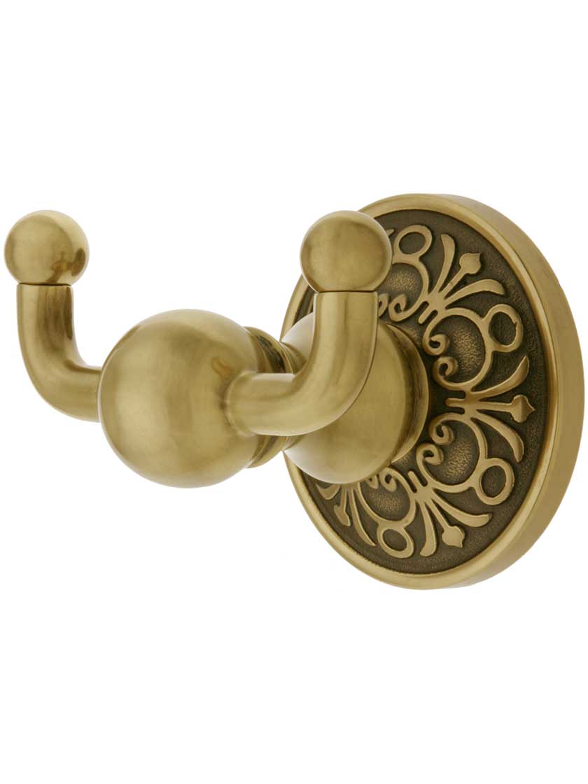 Solid Brass Double Hook with Lancaster Rosette in Antique Brass.